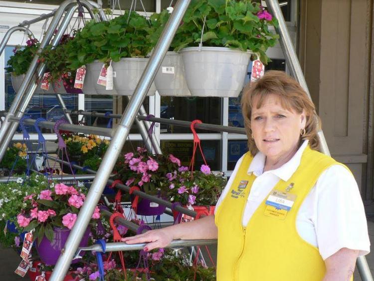 Lisa Taylor, customer service manager at the Walmart store in Falmouth, says her integrity award is really a team honor.   Kate Irish Collins/The Forecaster