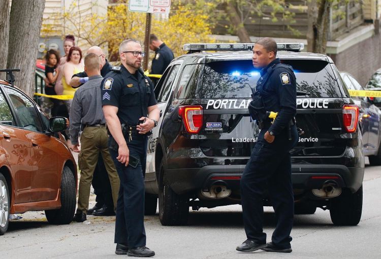 Police on the scene of a shooting on Parris Street in Portland on Sunday morning.