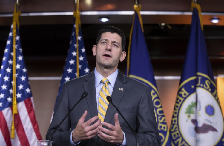 Speaker of the House Paul Ryan, R-Wisconsin, meets with reporters before a House showdown on immigration, at the Capitol in Washington on Thursday.