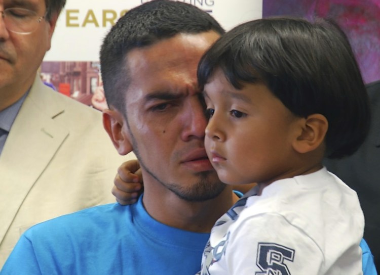 Javier Garrido Martinez holds his son in New York on Wednesday, when they were reunited after nearly two months apart. A reader compares the Trump policy to that of the Nazis and Stalin-era Soviets.