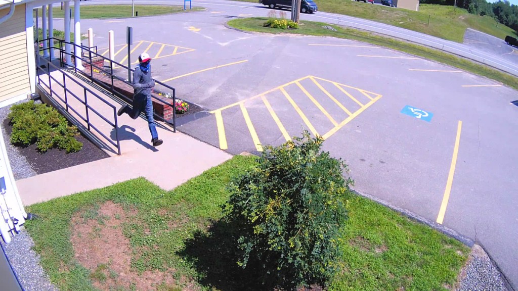 The suspect in the hold up of Bar Harbor Bank and Trust on Route 3 in South China was filmed running from the bank and is believed to have made his getaway with a nearby vehicle.