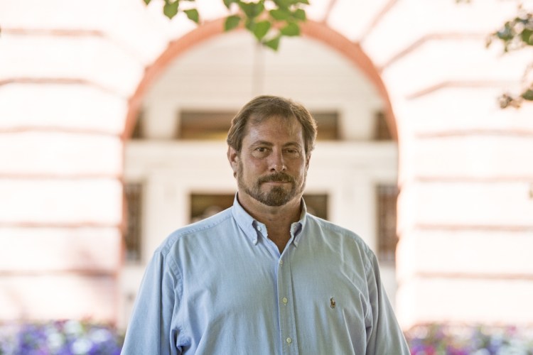 Mark Andre poses for a portrait Wednesday in front of Waterville City Hall.