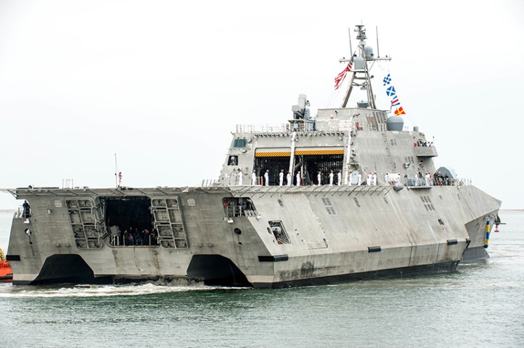 Sailors man the rails as the Independence-variant littoral combat ship USS Manchester (LCS 14) sails into Naval Base San Diego for the first time. 