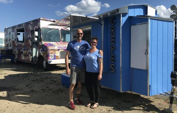 Lonnie Stinson and Brandi Haaf, owners of Crepe Elizabeth, prepare for a crowd in August at Thompson's Point in Portland.