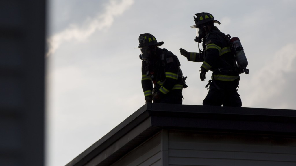 The city's deal with the local union that represents about 200 firefighters increases pay for new hires and gives Portland officials time to do a review of the department.