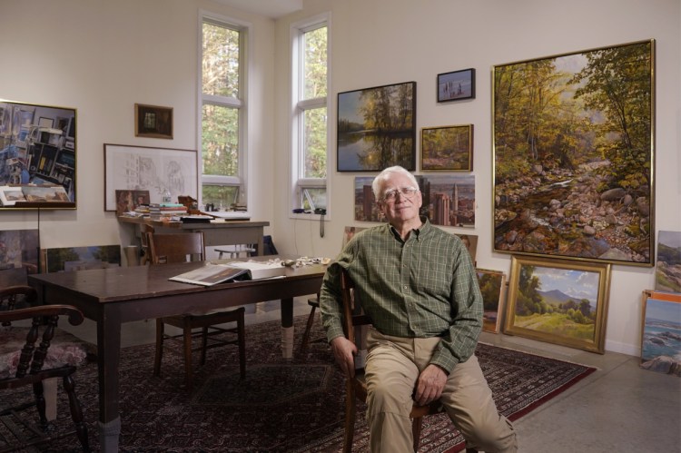 Artist Joel Babb poses for a photo in his studio in Sumner on August 24. 