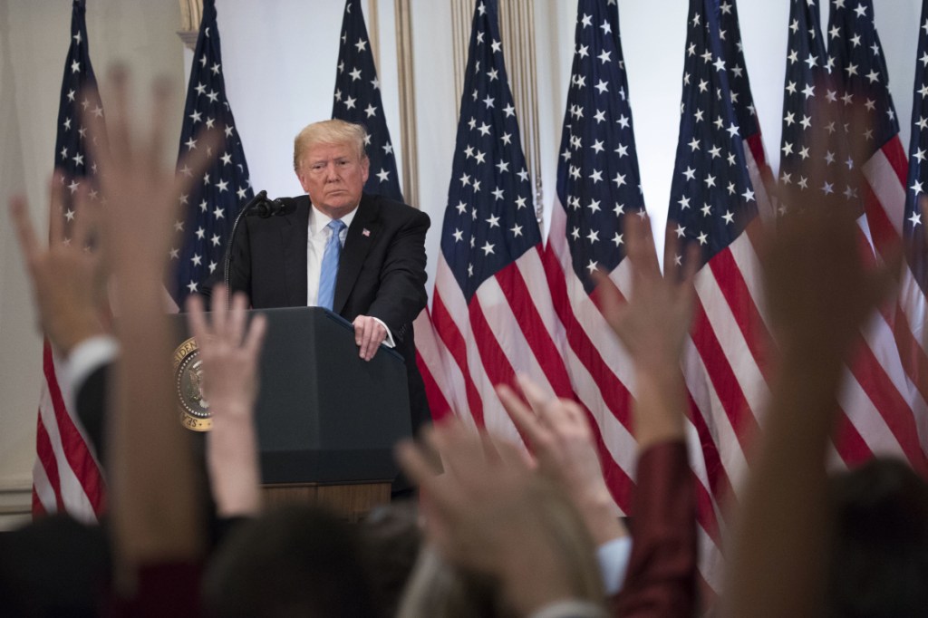 President Trump takes questions from reporters during a news conference Wednesday in New York.