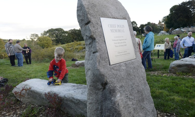 Aebel Shaughnessy, 3, of Westbrook plays at the memorial garden honoring Chief Polin and the First People of the Presumpscot River before its dedication Saturday in Westbrook.