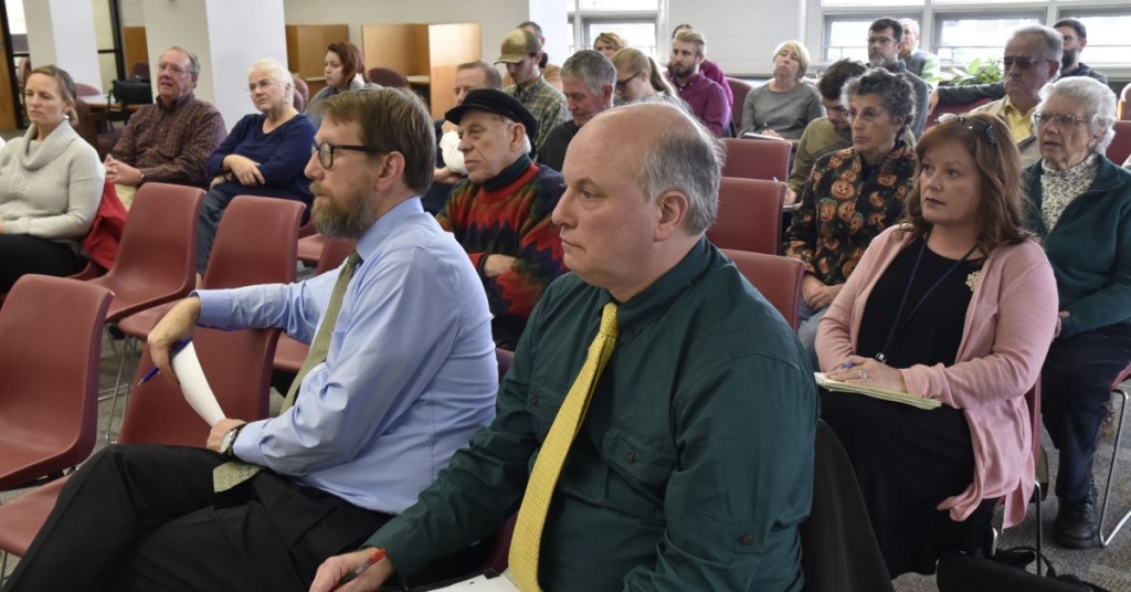 An audience listens Oct. 17 to an address by Kevin Concannon, former undersecretary of the U.S. Department of Agriculture for Food, Nutrition and Consumer Affairs, about combating poverty in Maine, at the University of Maine at Farmington.