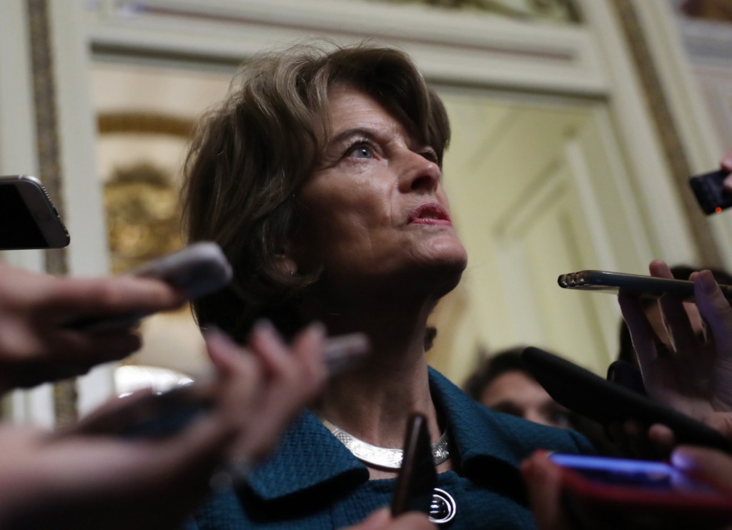 Sen. Lisa Murkowski, R-Alaska, speaks to the media on Capitol Hill on Friday.