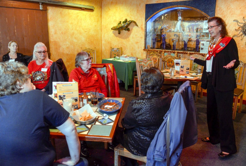 Jamie B. DePaola, Women Marines Association Area 1 director, speaks during a get-together of former Marine women Saturday at Margarita's in Augusta.