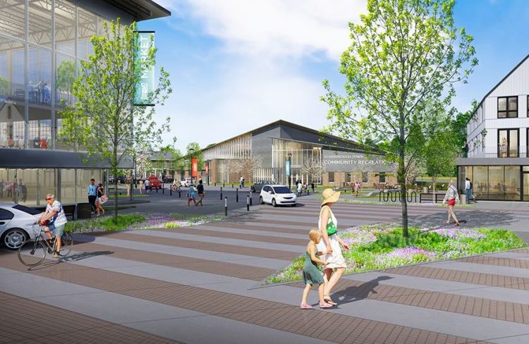 This rendering shows what Main Street might look like if a village center is built at Scarborough Downs, with a renovated and repurposed grandstand to the left and a possible community center in the center background.