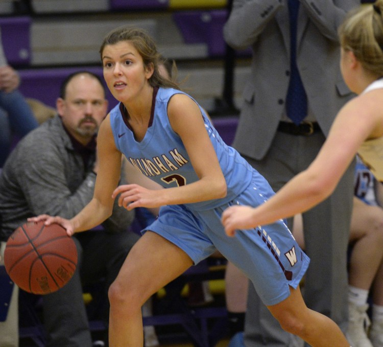 Meghan Hoffses of Windham drives with the ball during the 38-36 win over Cheverus on Friday night in Portland. Hoffses had 13 points and scored the winning basket.