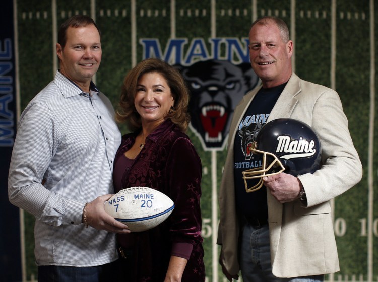 From left, University of Maine fans and alumni Dan Maloney, Class of '85, his wife, Lisa Maloney '86, and Jamie Keefe '86, plan to fly out west this weekend to watch the Black Bears take on Eastern Washington University in Saturday's Football Championship Subdivision semifinal. Back in the day, Maloney was an offensive lineman on the squad; Keefe played linebacker.