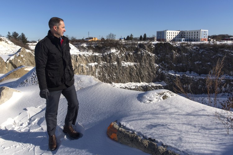 Developer Josh Levy near the quarry at the Rock Row site. The quarry will be made into a lake, which will be the focal point of the mixed-use development.