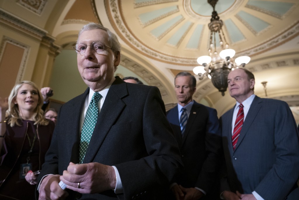 Senate Majority Leader Mitch McConnell, R-Ky., joined by fellow Republicans, speaks to reporters about the bipartisan compromise worked out to avert another government shutdown. The bill included funds for border security.