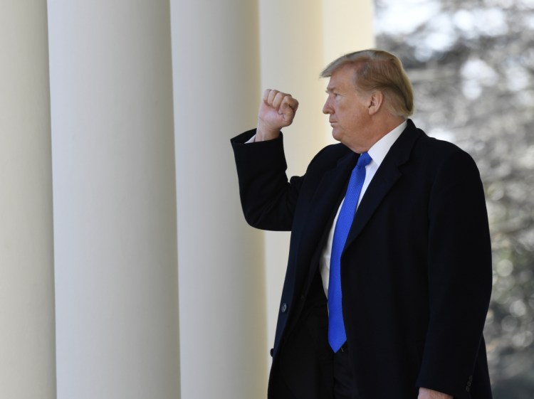 President Trump turns away from reporters after speaking at a Rose Garden event Friday about his decision to declare a national emergency in order to build a wall along the southern border.