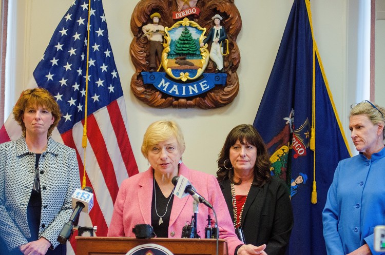 AUGUSTA, ME - FEBRUARY 8: Department of Administrative and Financial Services Commissioner Kirsten Figueroa, left, Gov. Janet Mills, Department of Education Commissioner Pender Makin, and Department of Health and Human Services Commissioner Jeanne Lambrew are behind the podium at the budget release news conference on Friday February 8, 2019 in the Cabinet Room at the Maine State House in Augusta. (Staff photo by Joe Phelan/Staff Photographer)