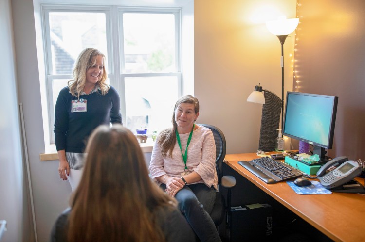 Cancer Patient Navigators, Jule Pelletier, RN and Heather Sinclair, LSW work together to assist patients.