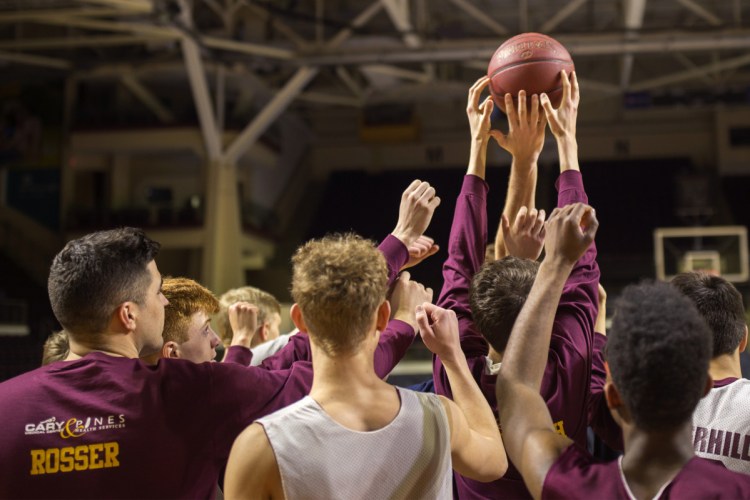 The Caribou High School boys practice in Portland Friday for the state championship game. “If you don’t know about the Mike Thurston half-court shot, then you’re not really from Caribou,” coach Kyle Corrigan said of the 1969 show-stopper.