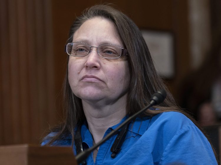 Michelle Dehetre of Lewiston listens to opening statements at Wednesday's Senate hearing on Capitol Hill, where she testified about her experience trying to buy insulin for her diabetes.