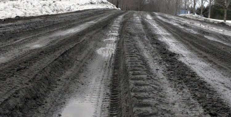 A road shows its muddy ruts in East Montpelier, Vt., last week. 