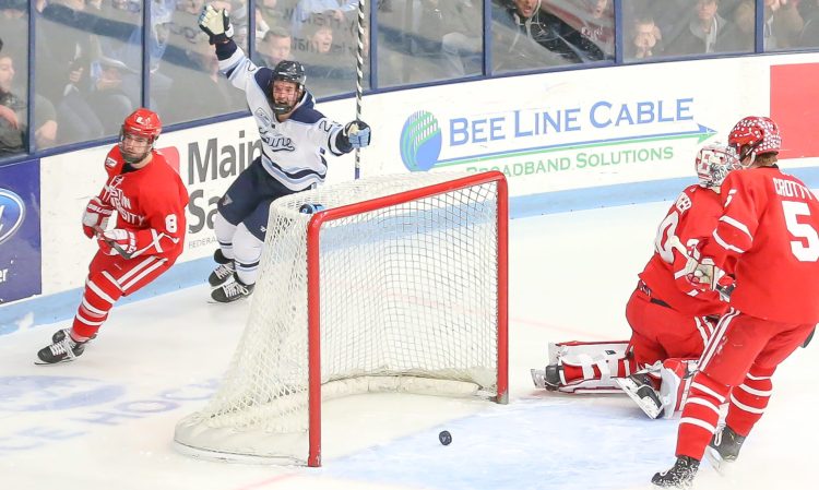 University of Maine senior Brendan Robbins celebrates his first-period goal against Boston University at Alfond Arena in Orono last Saturday night.