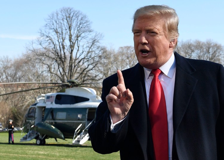 President Trump talks with reporters before boarding Marine One on the South Lawn of the White House on Thursday.