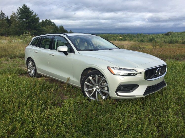 "Stylishly handsome, gracefully athletic, and festooned with a well-crafted interior." Photo by Tim Plouff. Location: Blueberry field, Otis.