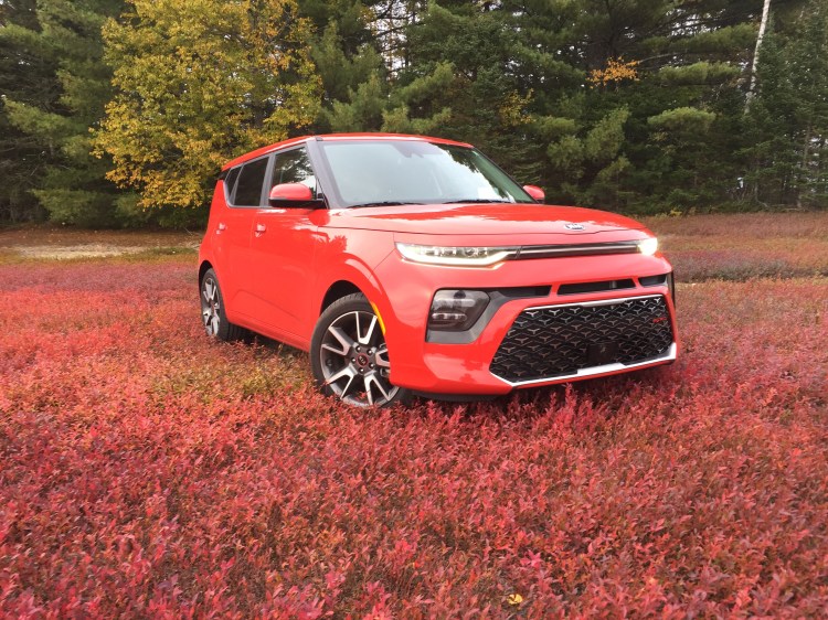 This Inferno Red GT has a rakish new face, with slotted LED-lamps, dual-exhaust tips at the center rear, plus special wheels and body accents.