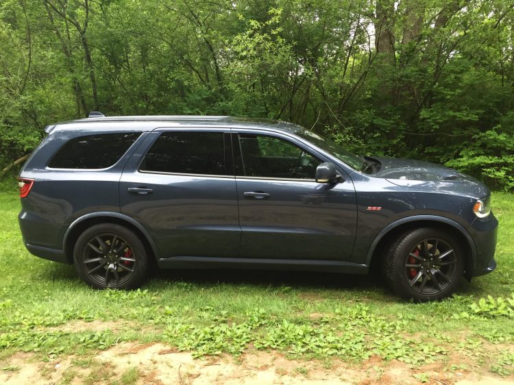 Our reviewer says the Durango's cabin "supports life on the road with a grace that fans appreciate. The Durango SRT likes to run, hard, with a cabin that coddles occupants."