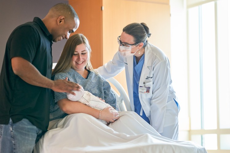 A doctor greets a brand new patient at the Birthing Center at Mercy Hospital