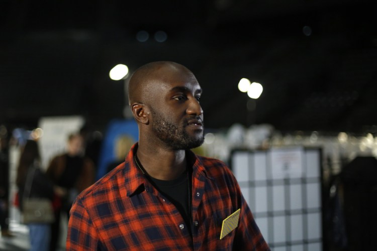 Designer Virgil Abloh walks backstage before his Off-White ready-to-wear fall-winter 2019-20 collection that was presented in Paris on Feb. 28, 2019. 

