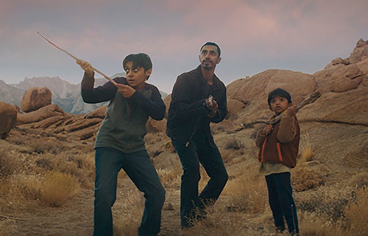 Lucian-River Chauhan, Riz Ahmed and Aditya Geddada in "Encounter."