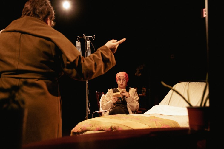 Janice Gardner, left, as Maura and Hannah Daly as Caroline in David Butler's "Dying to Know" at Mad Horse Theatre in South Portland.