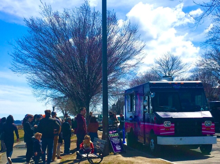 When the Totally Awesome Vegan Food Truck made its first appearance of the season at lunchtime in early April in Portland, a line stretched in front of the truck for hours, yet customers waited without complaint.