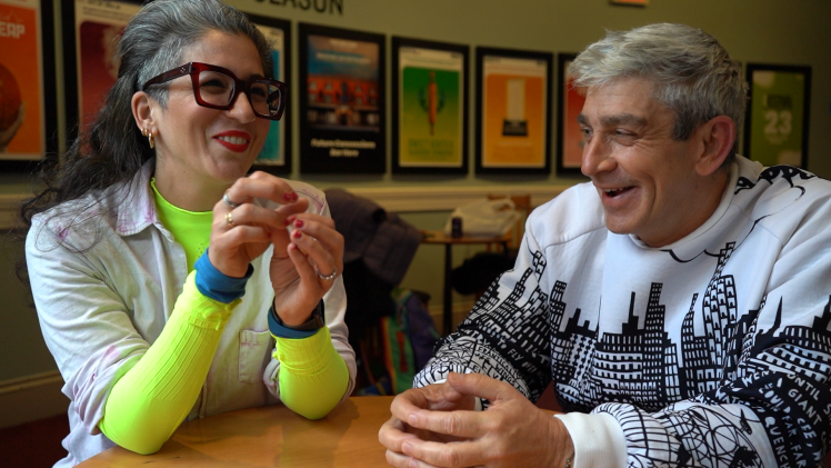 Writers Vanessa Garcia and Richard Blanco chat in the lobby at Portland Stage.